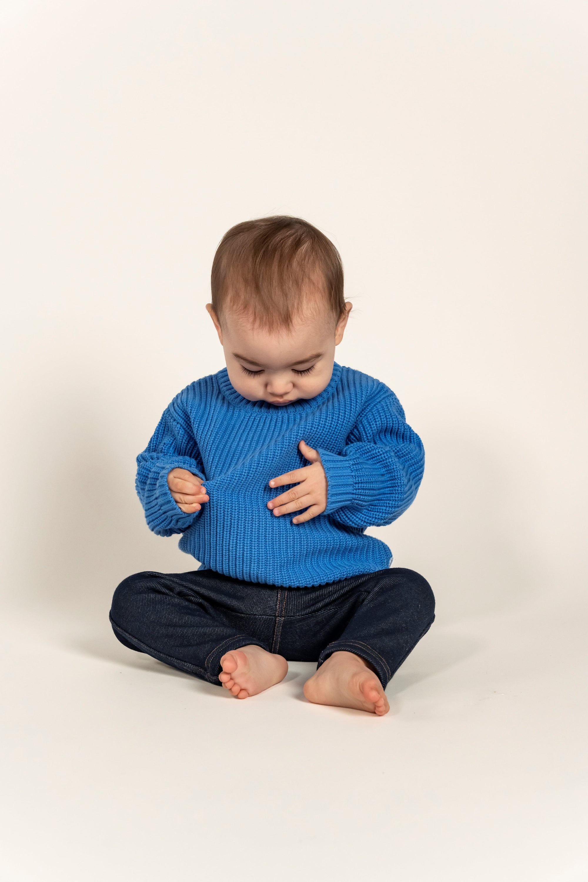 Soft and cozy Sky Blue Cotton Knit Jumper, perfect for your little one. Made from 100% breathable cotton, this jumper ensures comfort and warmth for cooler days. Available in toddler sizes now!