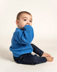 Sky Blue Cotton Knit Jumper for babies, featuring soft, breathable fabric, ribbed cuffs, and a classic crew neck. Perfect for layering, designed for comfort and style in colder months.