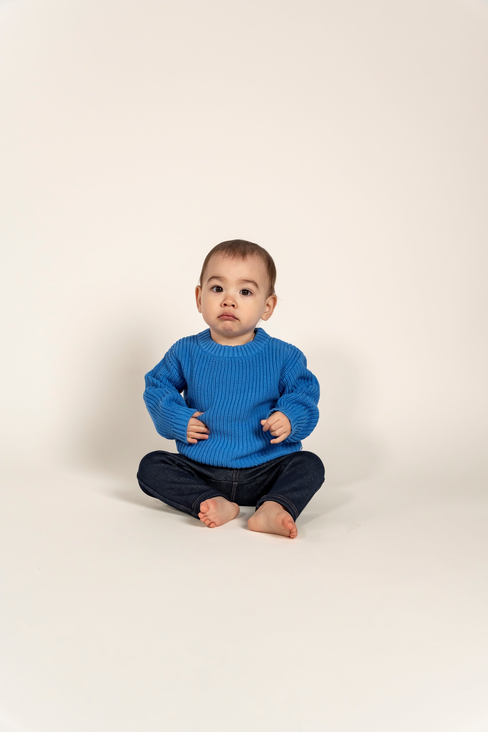 Adorable Sky Blue Cotton Knit Jumper, perfect for keeping your little one warm and stylish. This soft, breathable knit features a classic ribbed design, ideal for layering and everyday wear. Size available now!