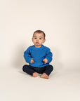 Adorable Sky Blue Cotton Knit Jumper, perfect for keeping your little one warm and stylish. This soft, breathable knit features a classic ribbed design, ideal for layering and everyday wear. Size available now!